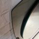 Vintage smoked glass mirror from around 1970.