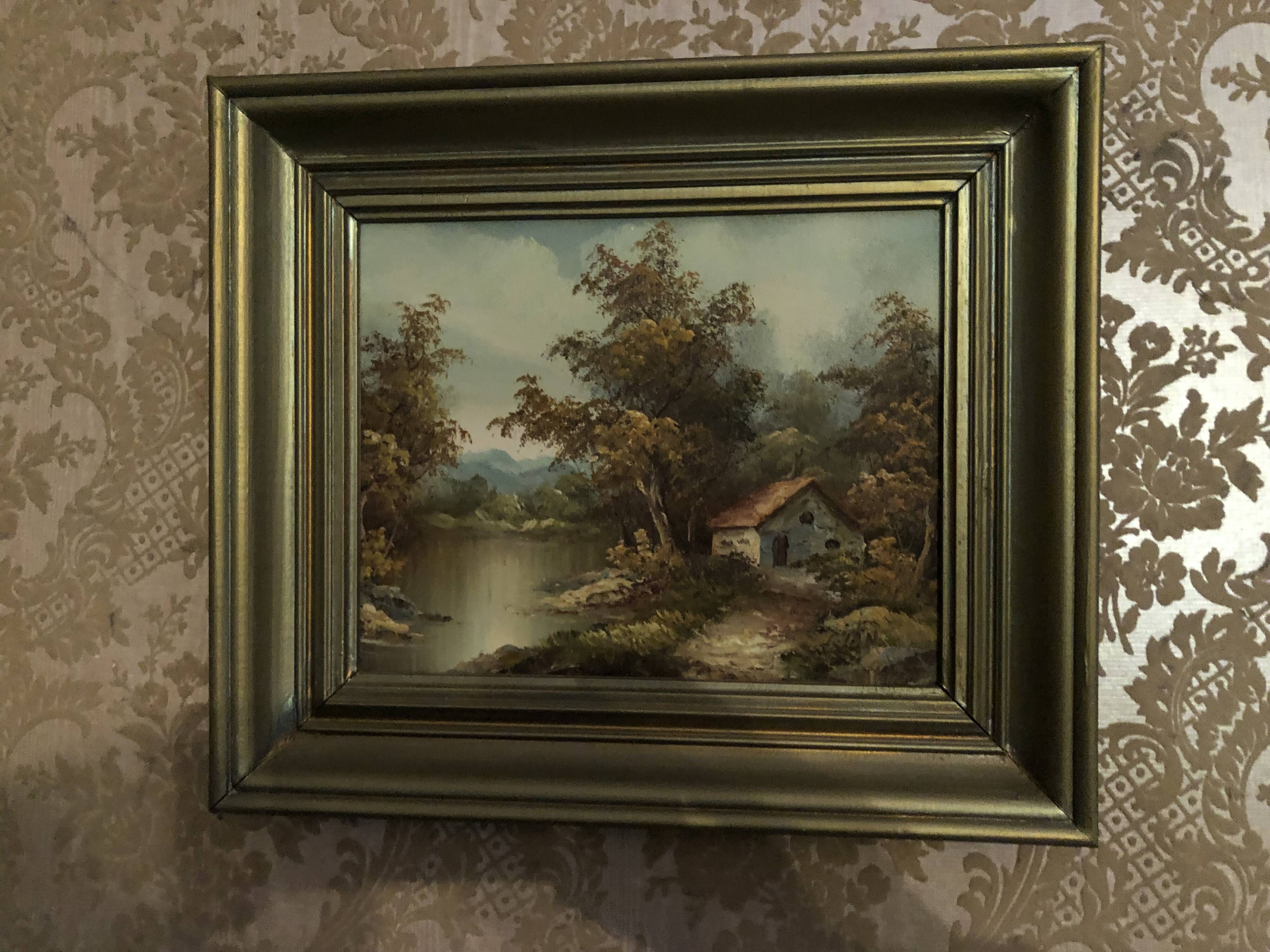 Vintage landscape painting with a house signed GIAN.
