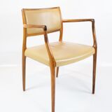 Pair of N.O. Moeller armchairs, model 65, in rosewood and light leather