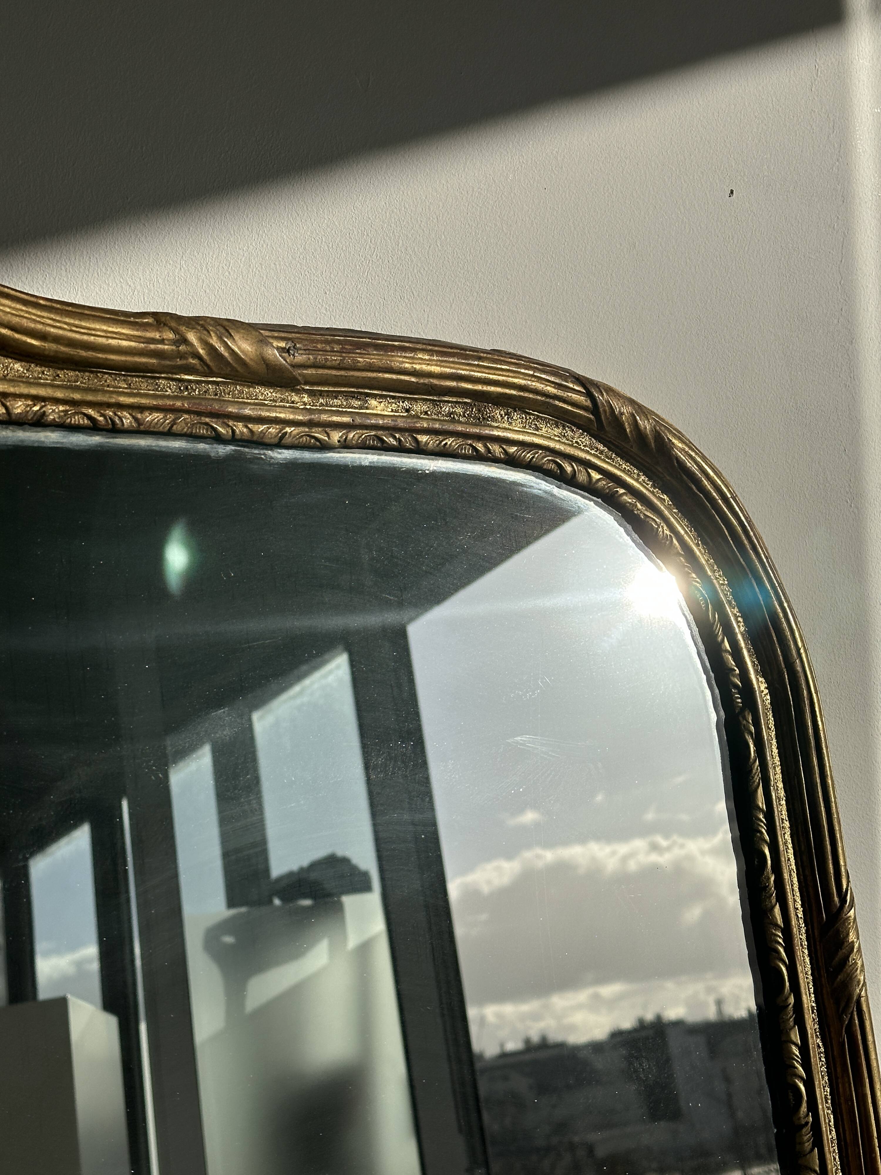 Large gilded mirror 19th century rounded corners mercury glass Louis XVI style