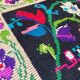 Tapis de laine roumaine design floral avec bordure verte sur fond noir 180x153cm