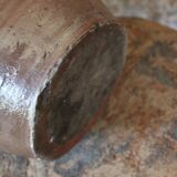 Vernified sandstone oil jar with handle