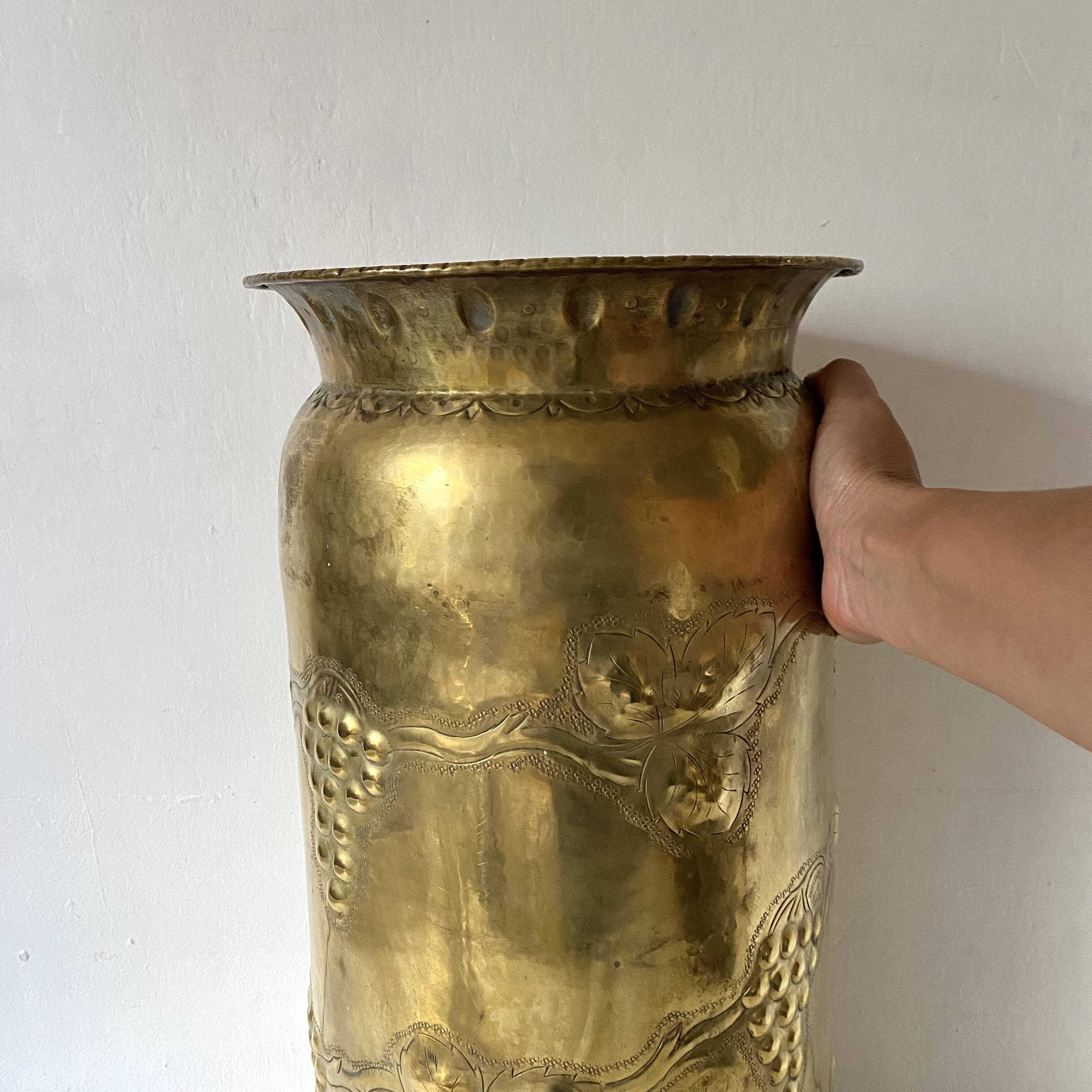 Umbrella stand in embossed golden brass
