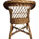 Vintage, children's armchair in woven rattan from around 1970.