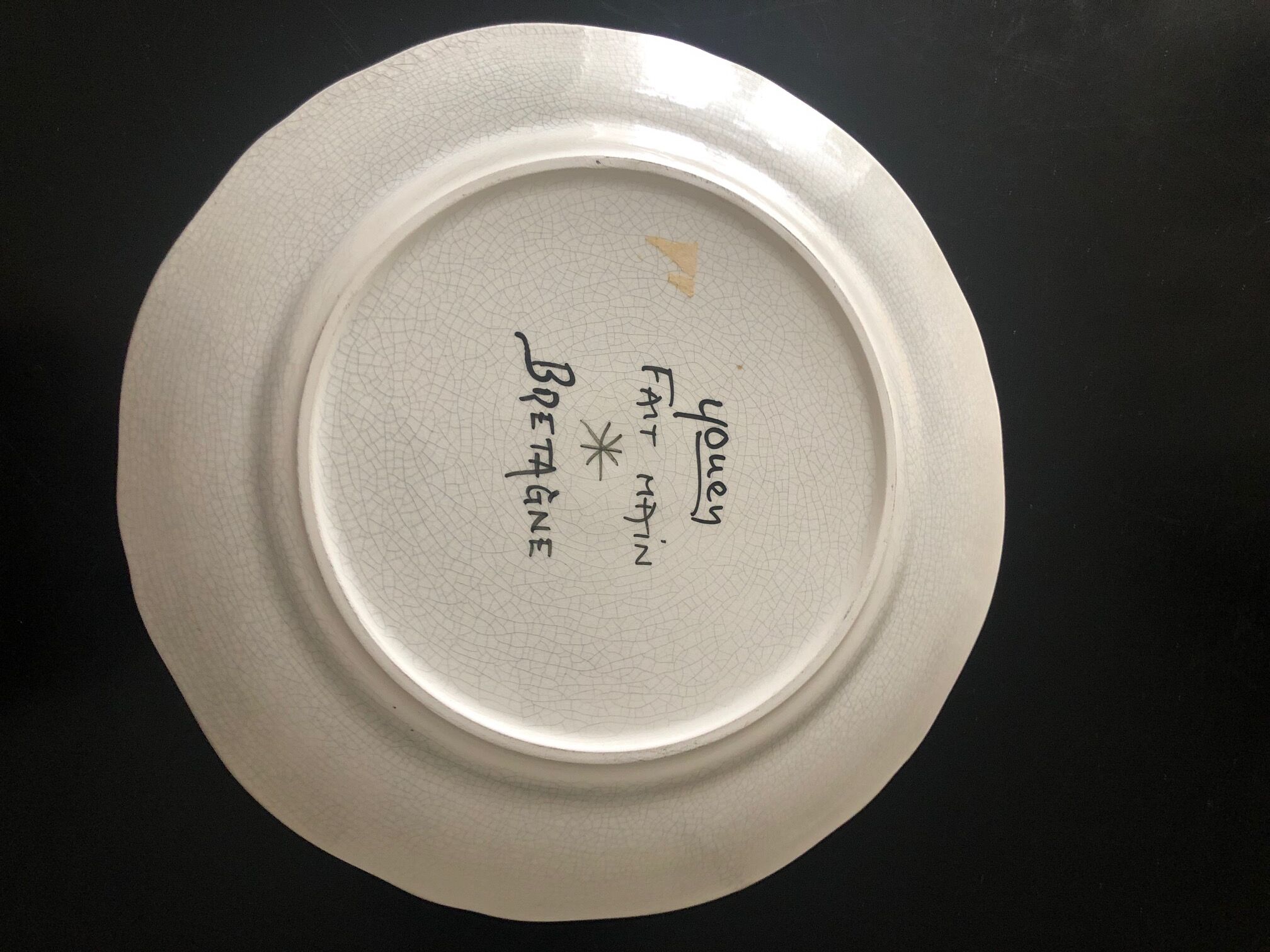 Plate in faience of quimper signed youen