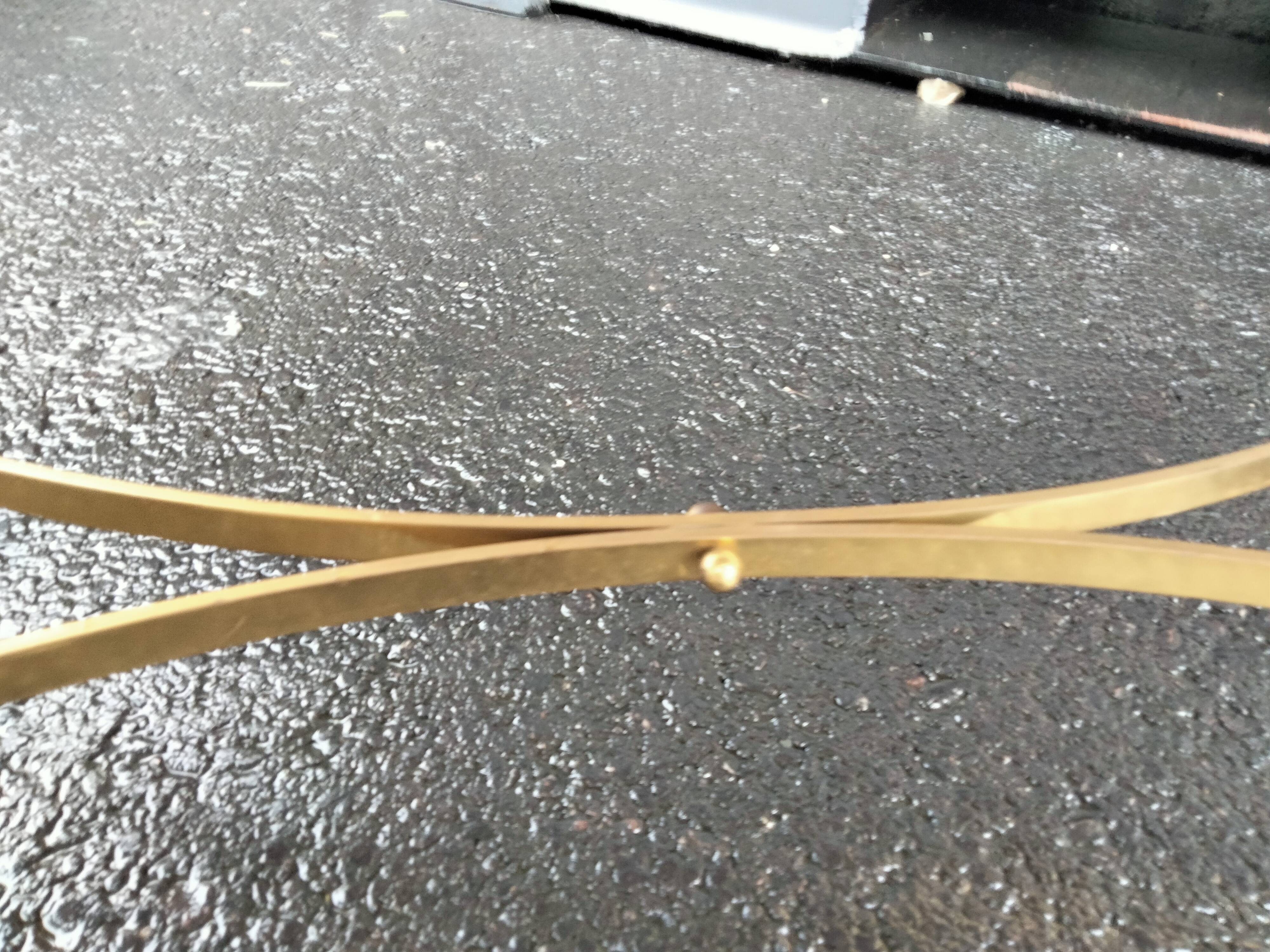Old vintage gilded side table with marble top