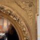 Louis XVI Style Medallion Mirror in gilded wood