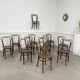 Suite de 12 chaises de bistrot à gaufrage végétal 1920