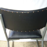 Old industrial chair in skai and metal