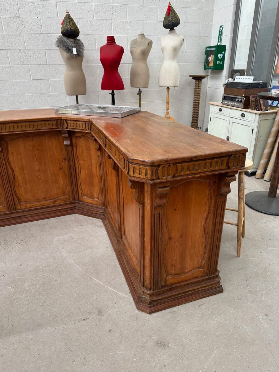 Large corner bar counter from the late 19th century.