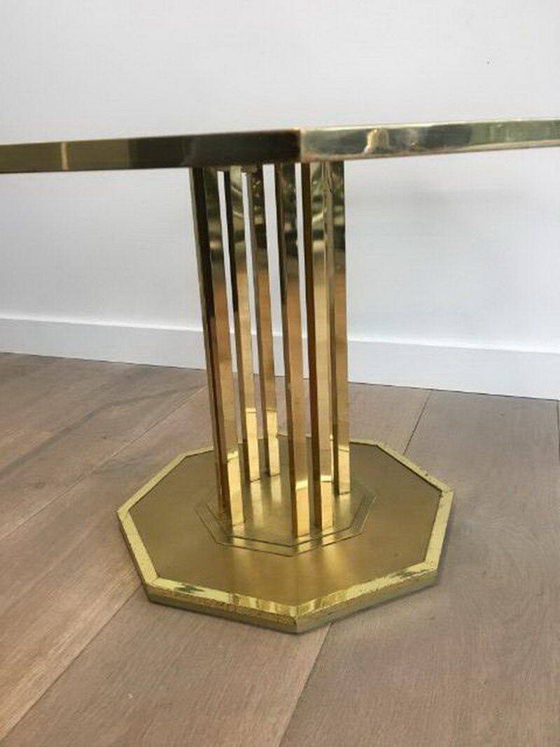 Designer coffee table in brass and glass