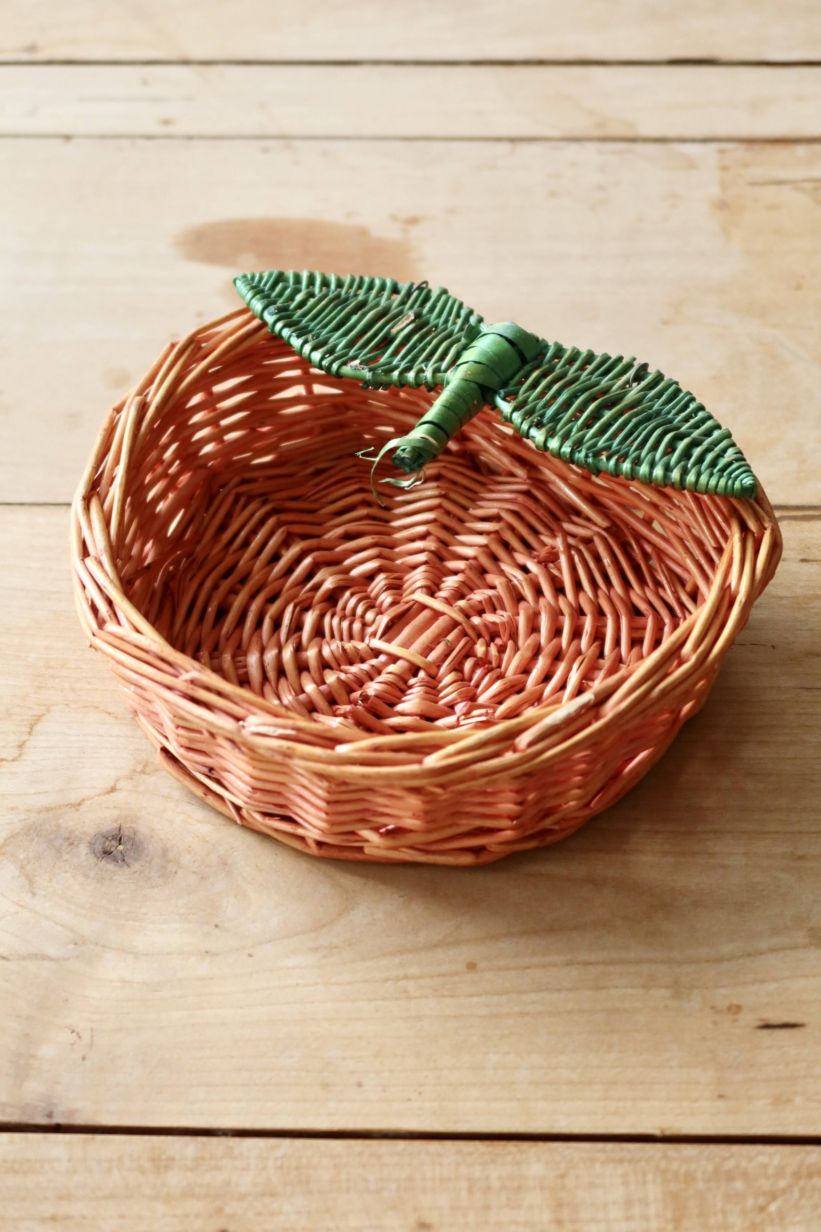 Small vintage wicker baskets in the shape of orange and lemon fruit