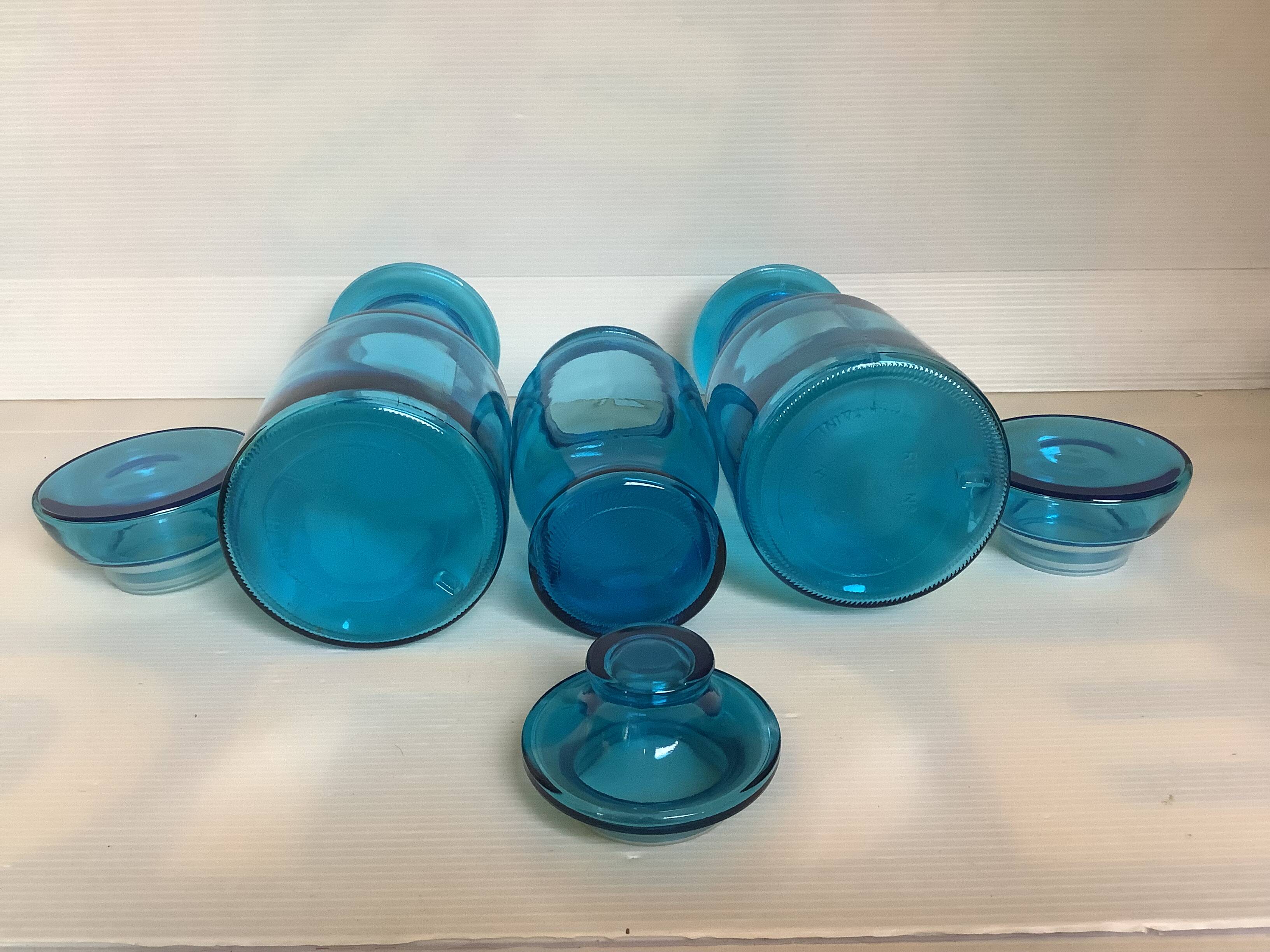 Trio of blue glass candy jars from the 70s
