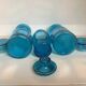 Trio of blue glass candy jars from the 70s