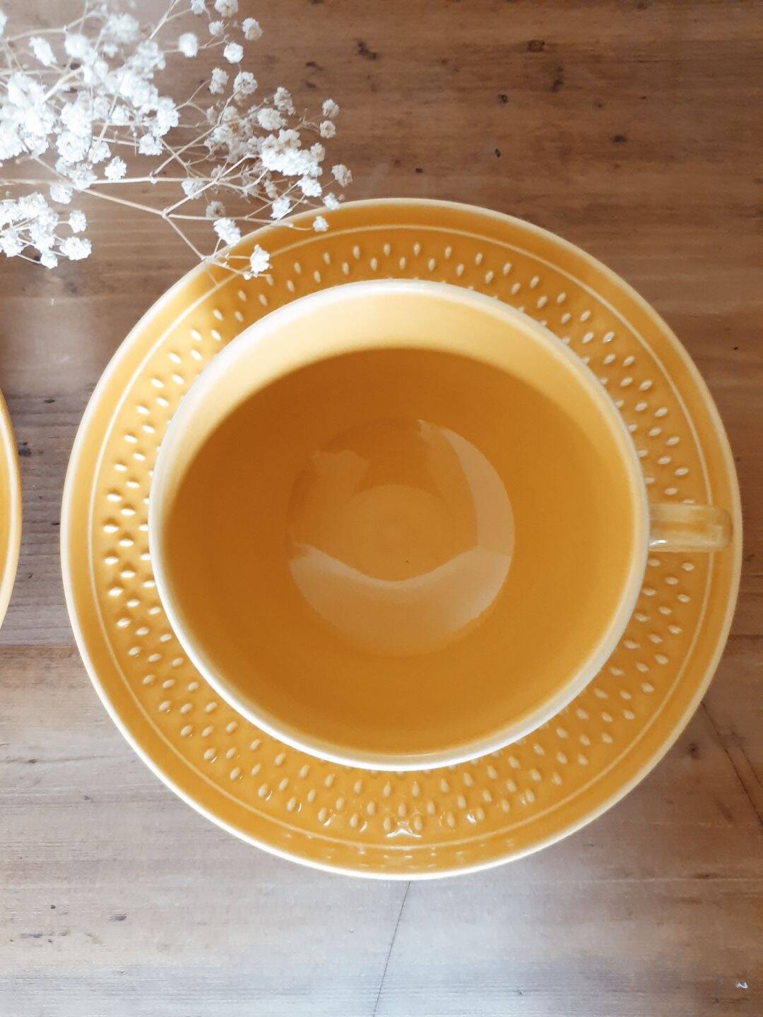 Duo of grain of rice cups and saucers