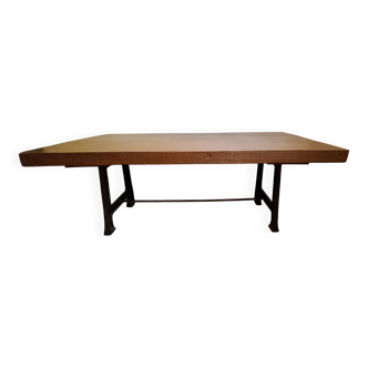 Industrial-style table with a mahogany top.