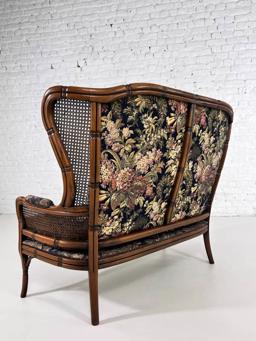 Wingback 2-seater sofa in carved wood, cane and fabric