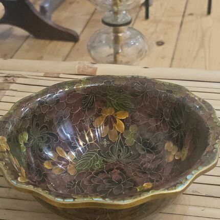Vintage Asian brass bowl with floral decoration.
