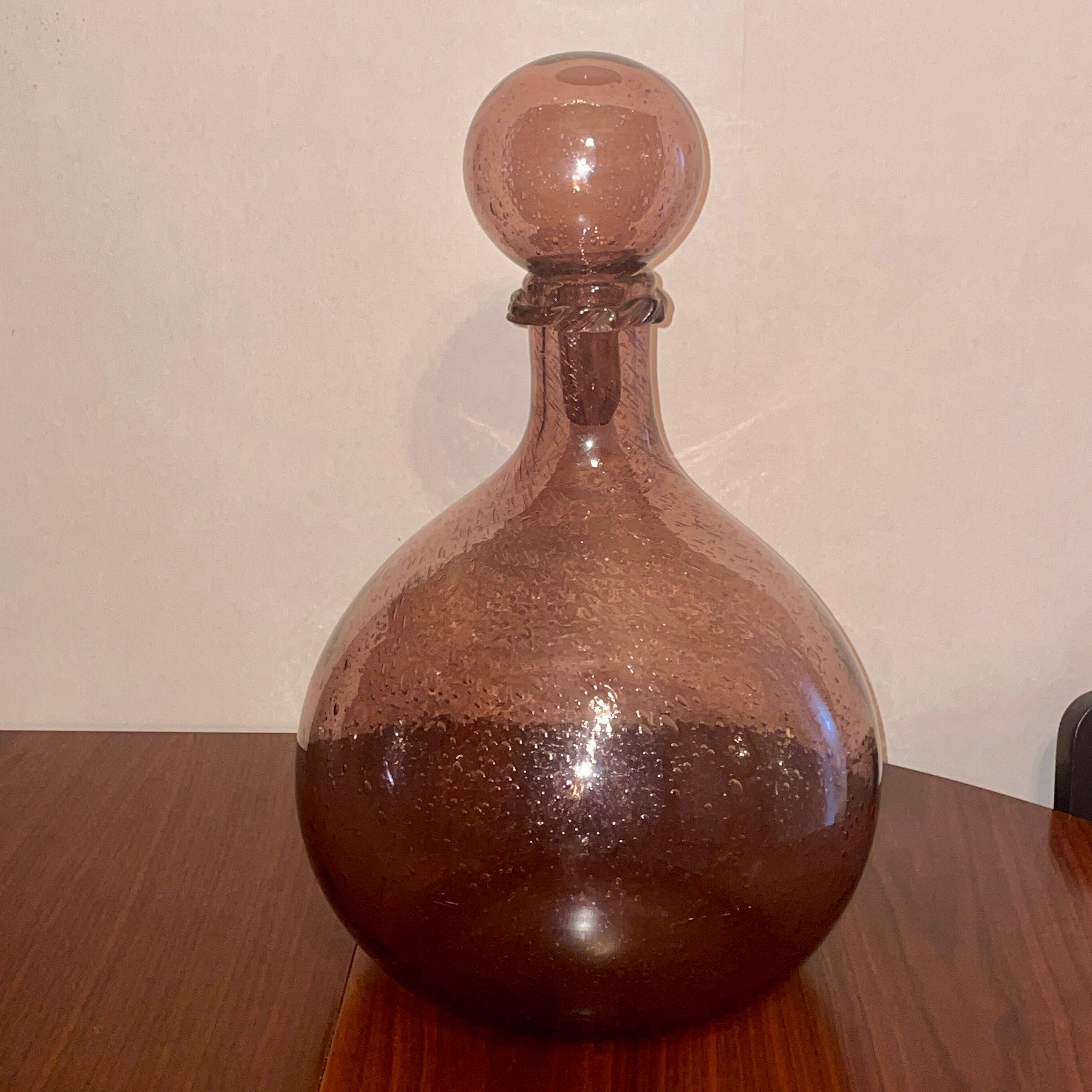 Bottle  in blown and bubbled glass