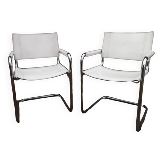 Pair of white leather armchairs