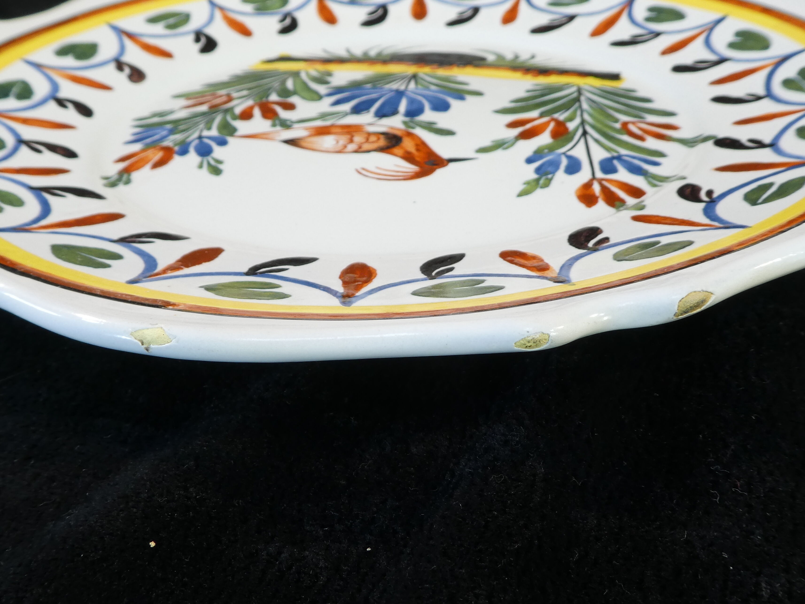 Plate in Faience of MALICORNE signed Emile TESSIER decor bird