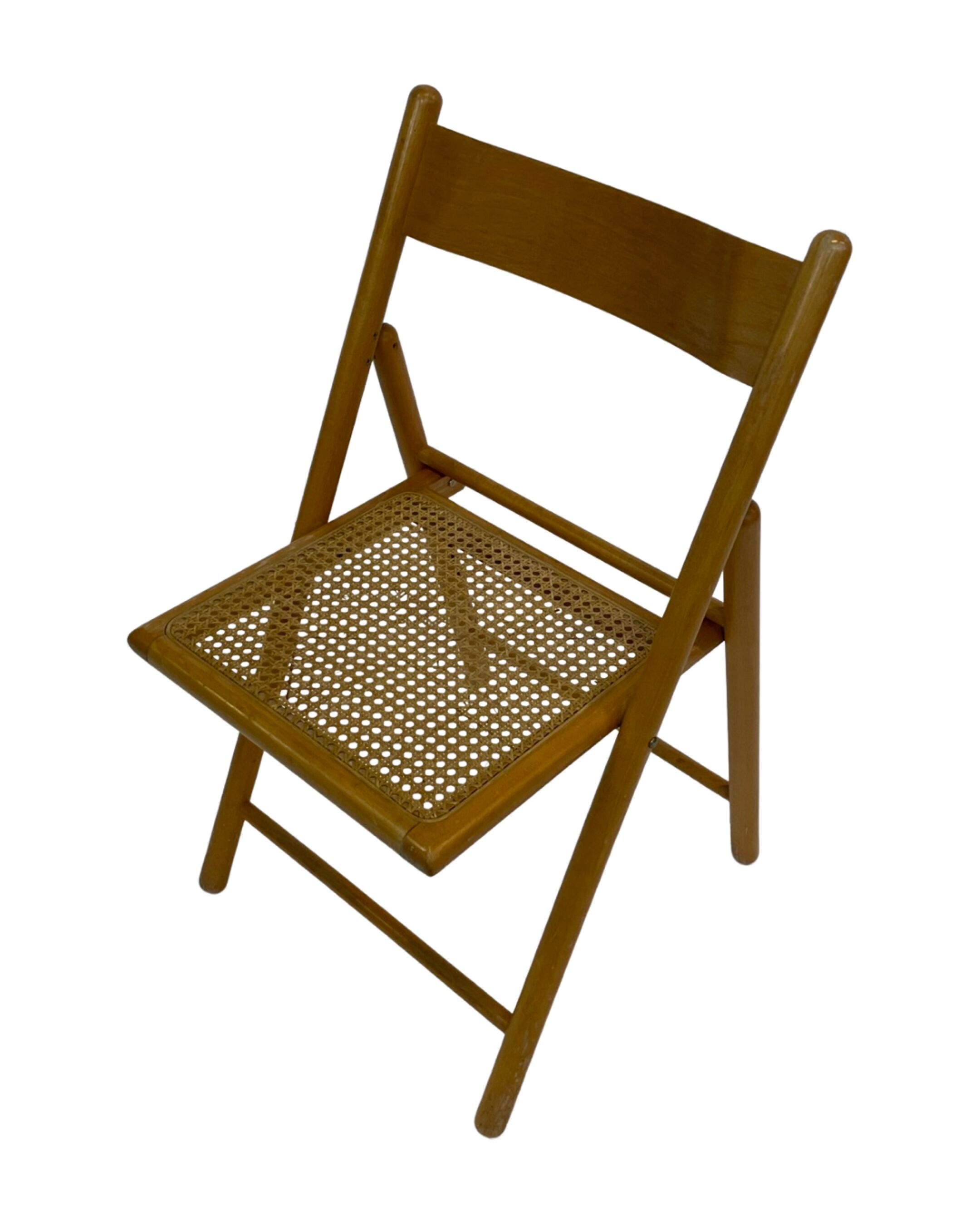 Set of four vintage folding chairs with webbing and wood 1970s
