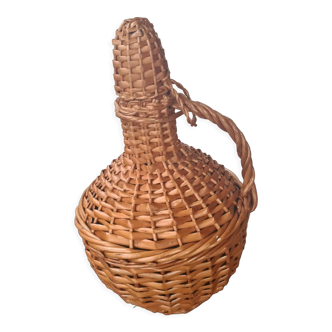 Glass bottle and woven wicker