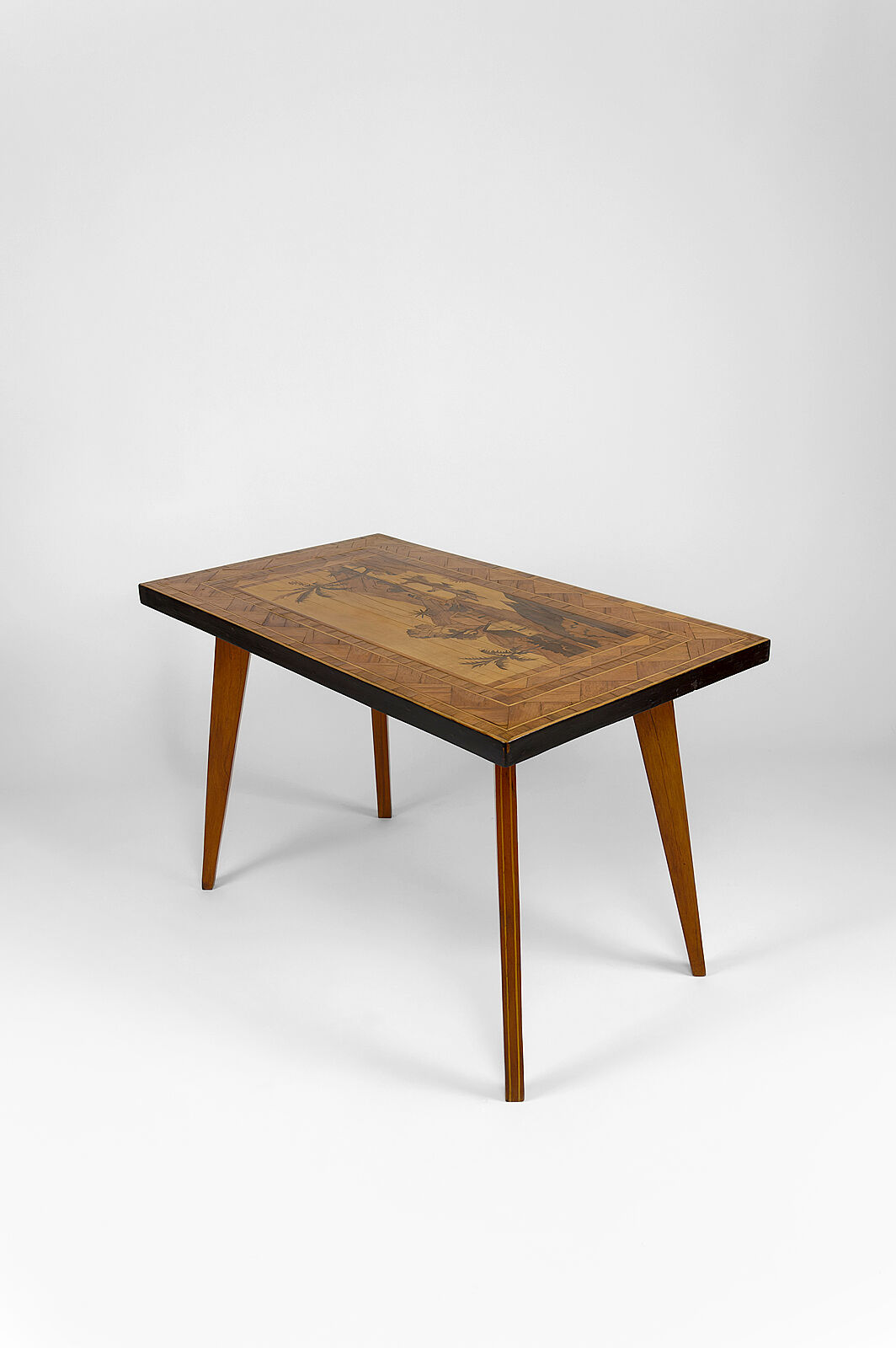 African Midcentury coffee table in inlaid wood, circa 1960