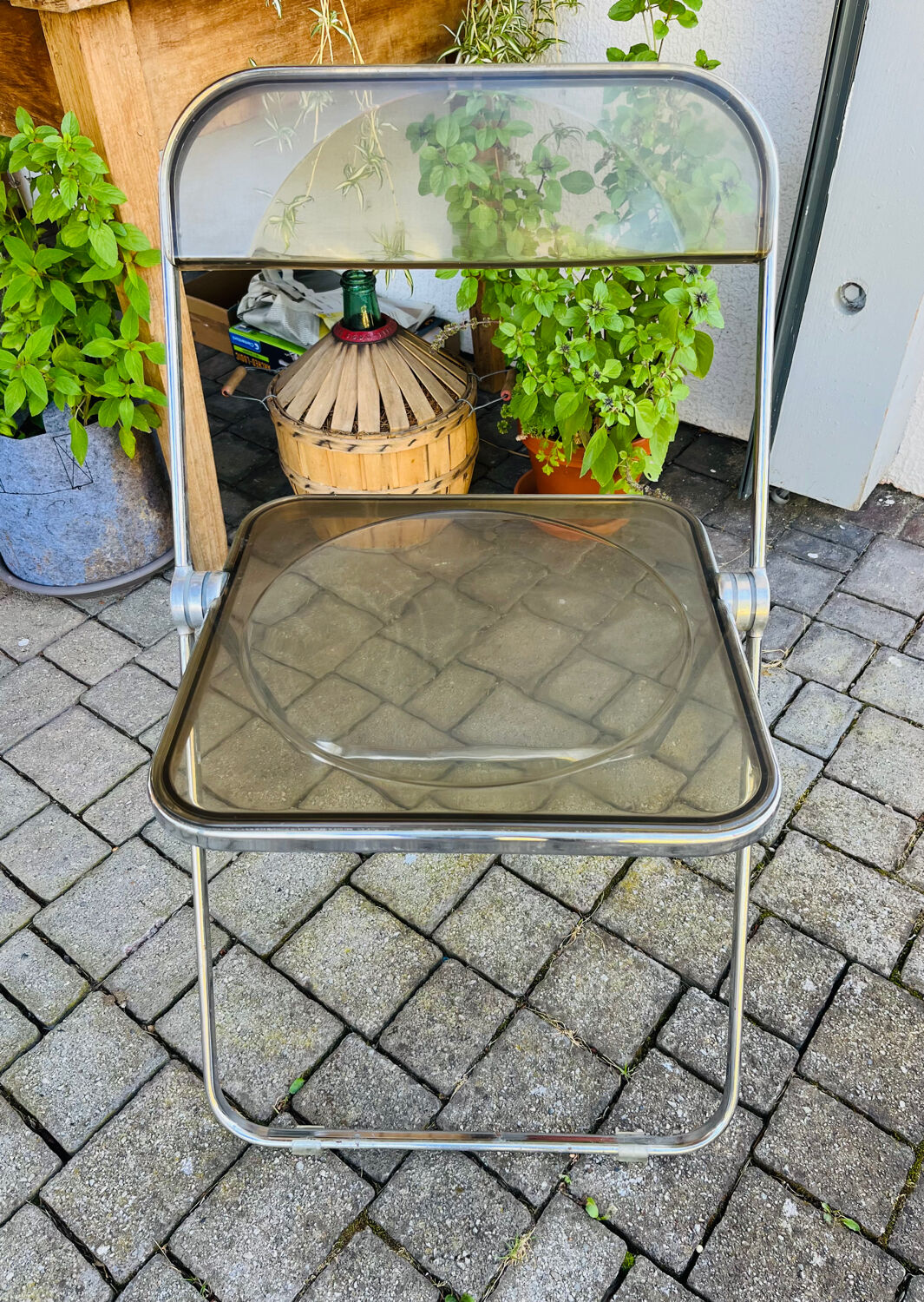 Plia folding chair by Giancarlo Piretti