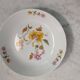 Porcelain deep plates with floral decoration