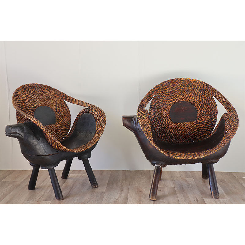Paire de fauteuils vintage bois sculpté et rotin 1960