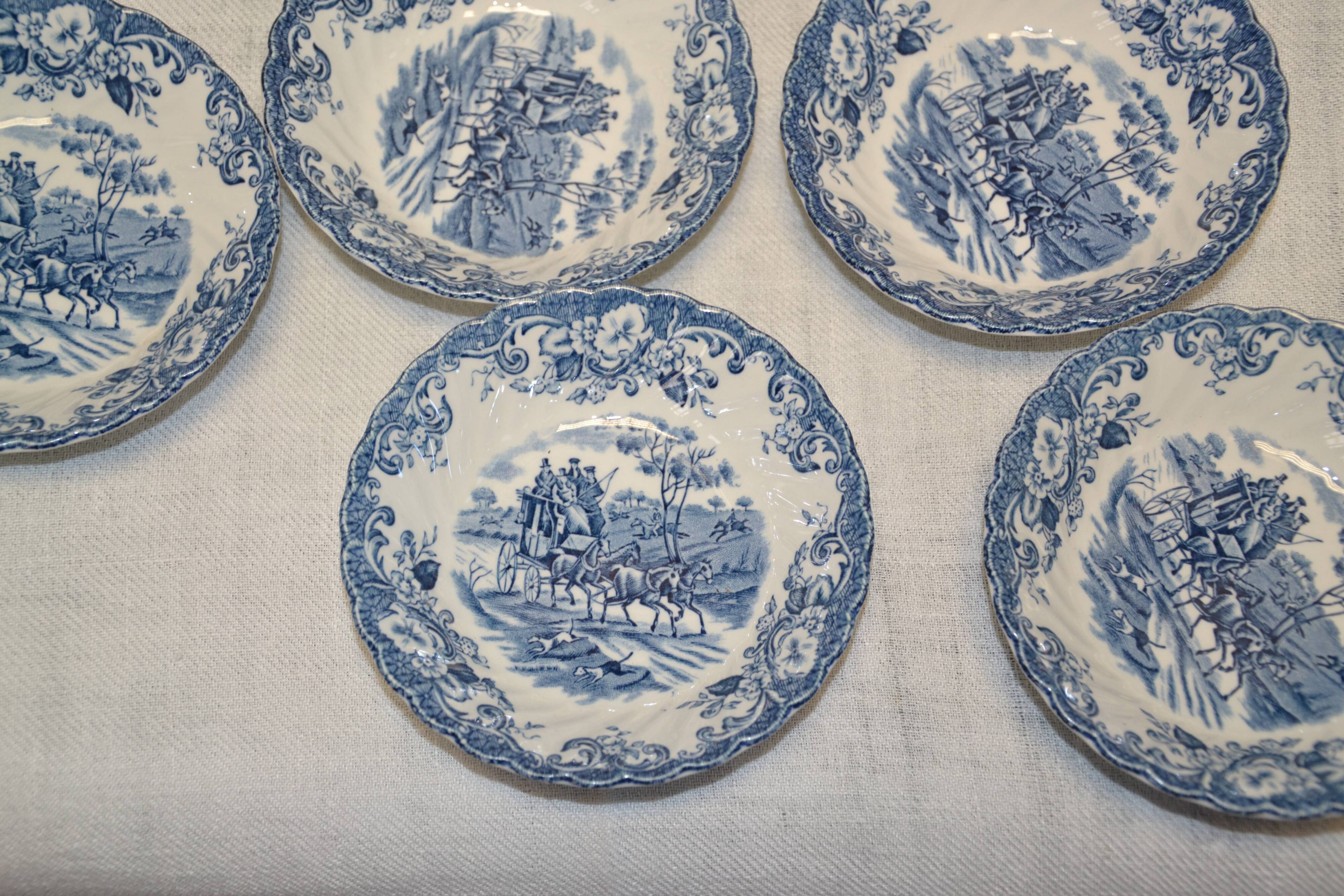 lots of 8 bowls with blue decor