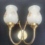 Pair of vintage wall sconces in gilded brass and pink opaline glass.