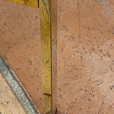 Gold metal and smoked glass console table.