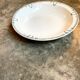 Round and hollow dish St Amand & Hamage in white and blue iron earth