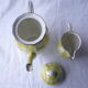 Art Deco style iridescent yellow porcelain coffee service