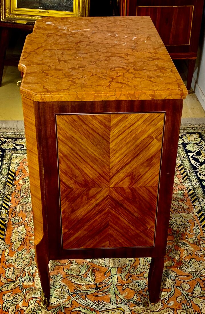 Transition style chest of drawers in rosewood and violet wood, ebony and gilded bronzes