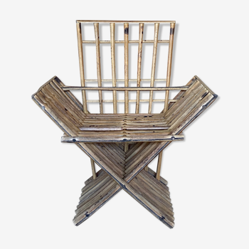 Antique armchair in raw bamboo