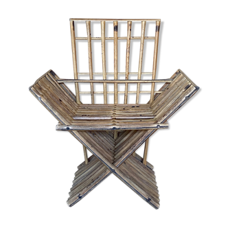 Antique armchair in raw bamboo