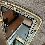 Asymmetrical free-form mirror from the 1970s