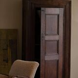 Tall antique oak wardrobe, made by a French cabinetmaker, late 19th century.
