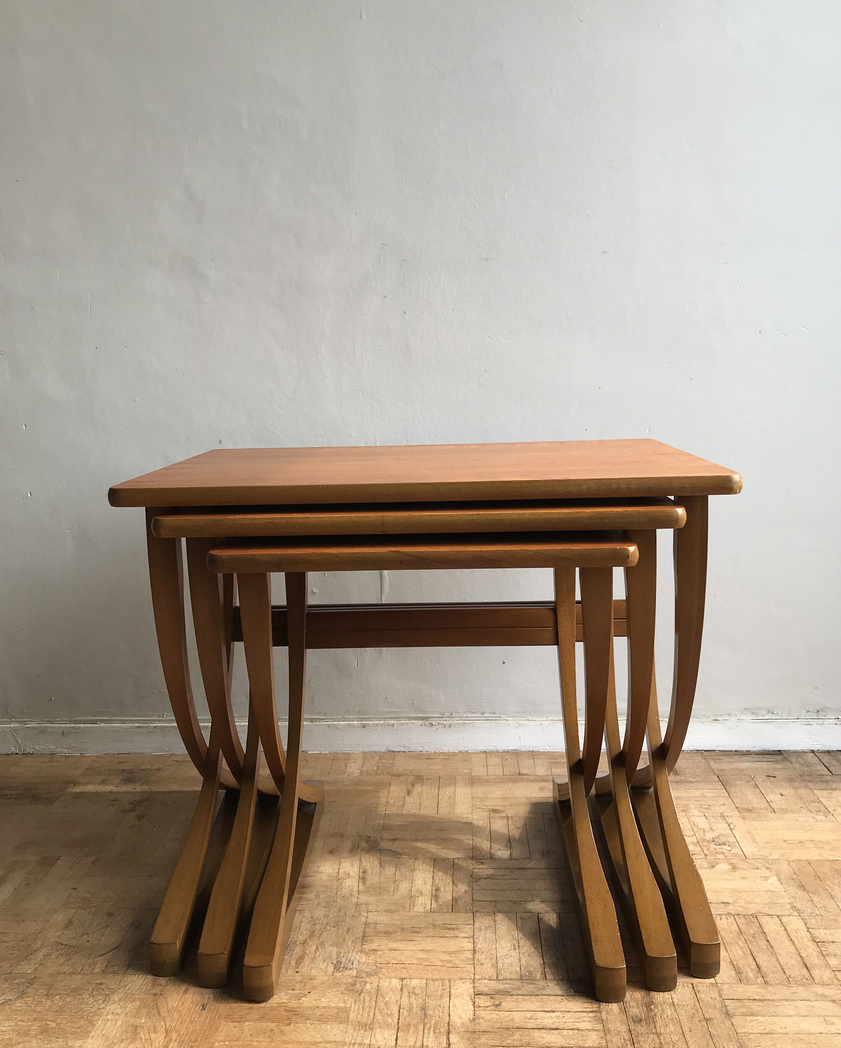 Set of 3 nesting tables from Nathan editions in teak and beech.