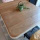 Restored oak table in natural wood and linen.