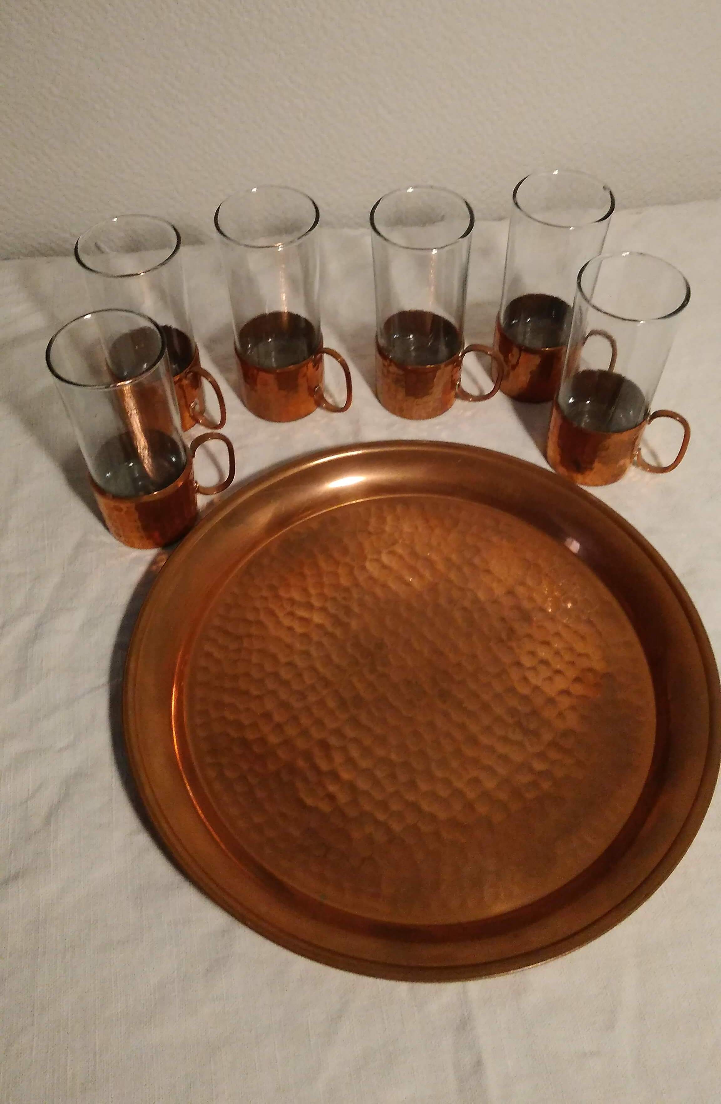 Liquor service or glass and copper tea