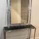Console and chrome faux-bamboo mirror