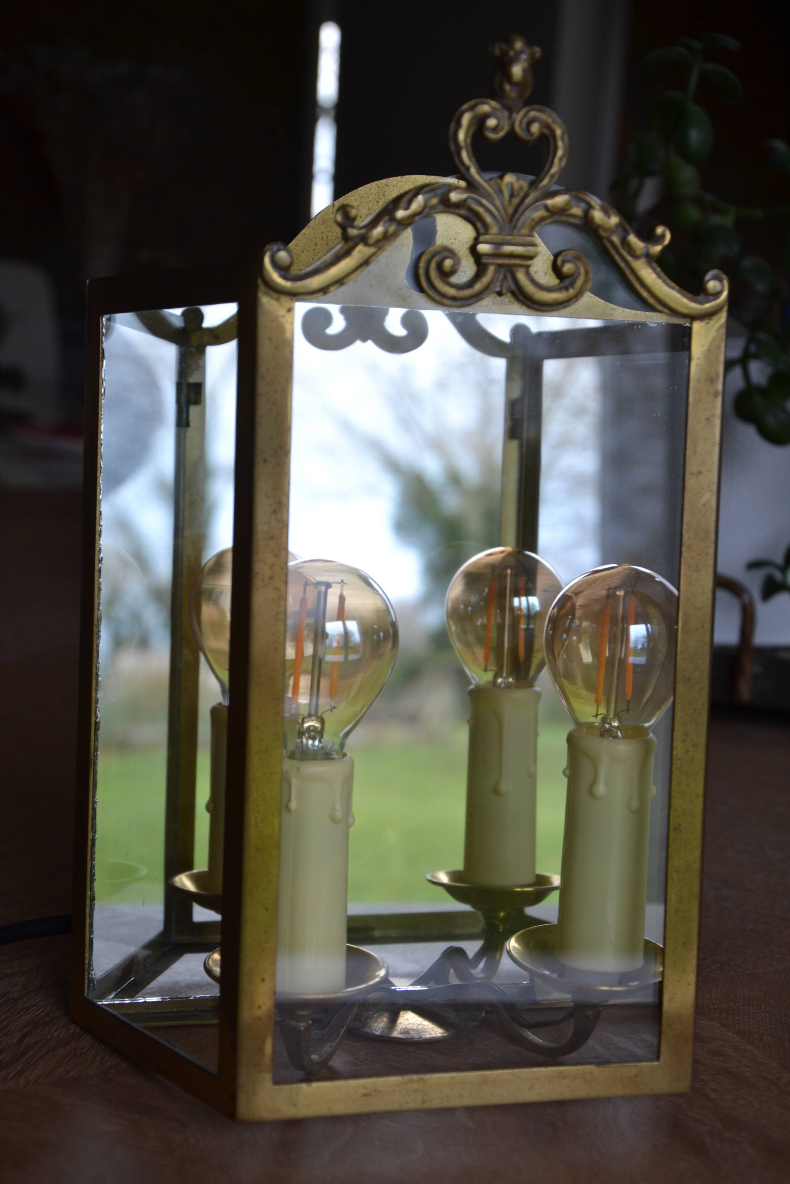 Antique glass wall light in brass