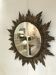 Sun mirror decorated with golden leaves, circa 1950.