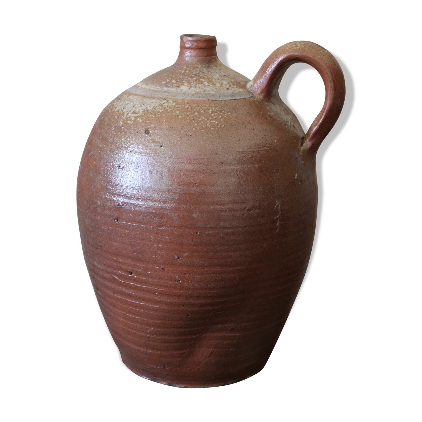 Vernified sandstone oil jar with handle