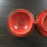 Pair of red cups and saucers