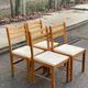 4 Scandinavian dining chairs in solid wood and fabric from the 1980s.